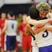 Pioneer High School's Cal Kirchen hugs Duane Simpson-Redmond after beating Bedford High School 64-61 at Pioneer on Tuesday, Feb. 19, 2013. Melanie Maxwell I AnnArbor.com
